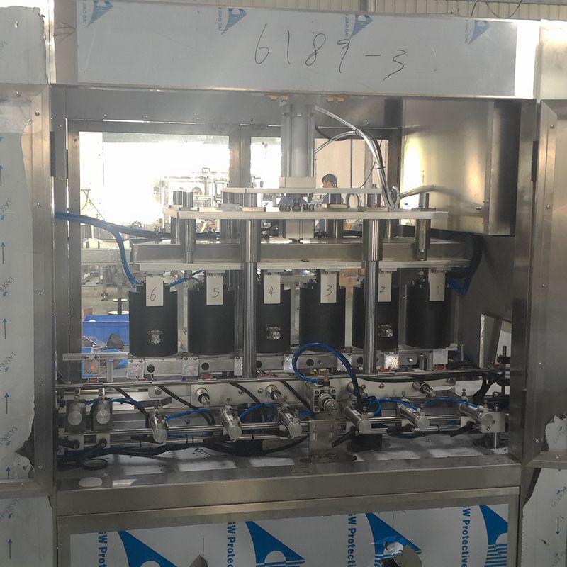Emballage en plastique Machine automatique à vide à haute vitesse pour 6 têtes de bocaux en verre