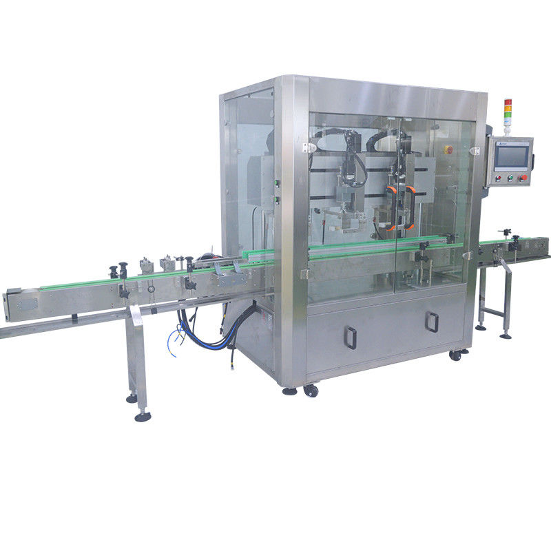 Machine automatique de fermeture à trois têtes de haute performance pour bouteilles en plastique de capacité 4000 BPH