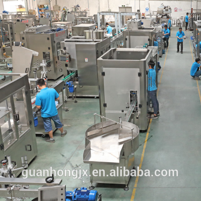 Machine de remplissage multi-têtes à grande vitesse pour adhésif adhésif et ciment dans les emballages cartonnés