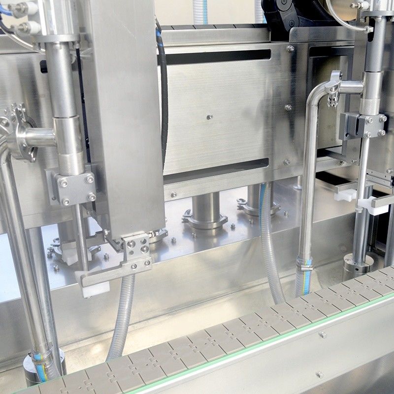 Machine de remplissage d'huile lubrifiante et de shampooing liquide à double tête de suivi