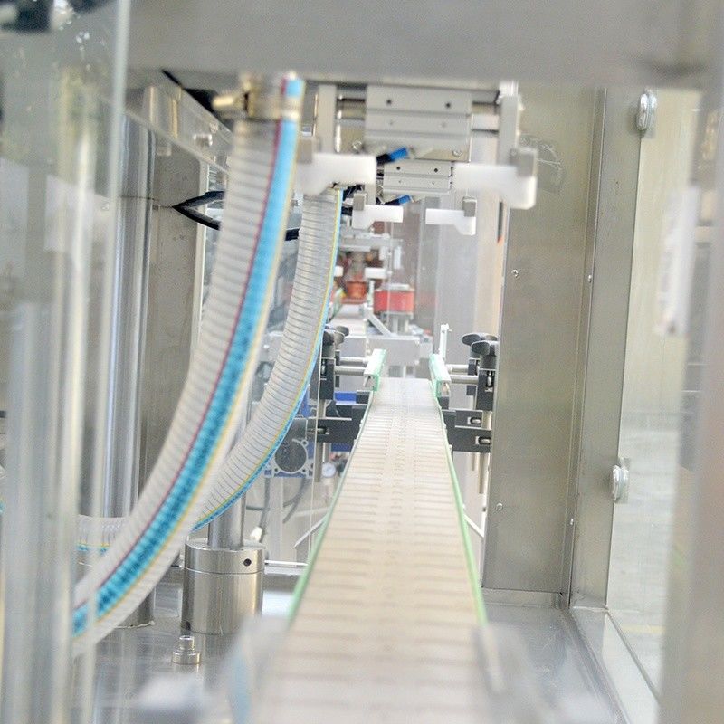 Machine de remplissage d'huile lubrifiante et de shampooing liquide à double tête de suivi