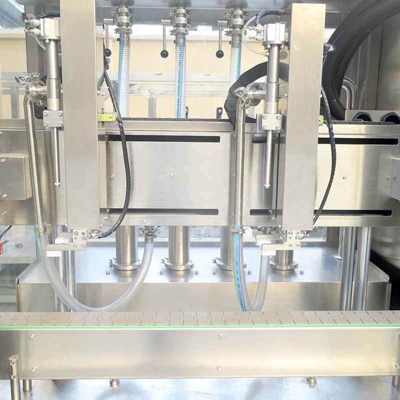 Machine de remplissage d'huile lubrifiante et de shampooing liquide à double tête de suivi