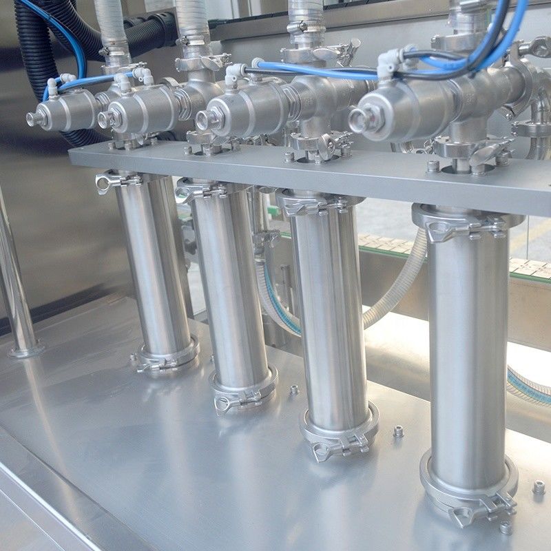 Machine de remplissage d'huile lubrifiante et de shampooing liquide à double tête de suivi